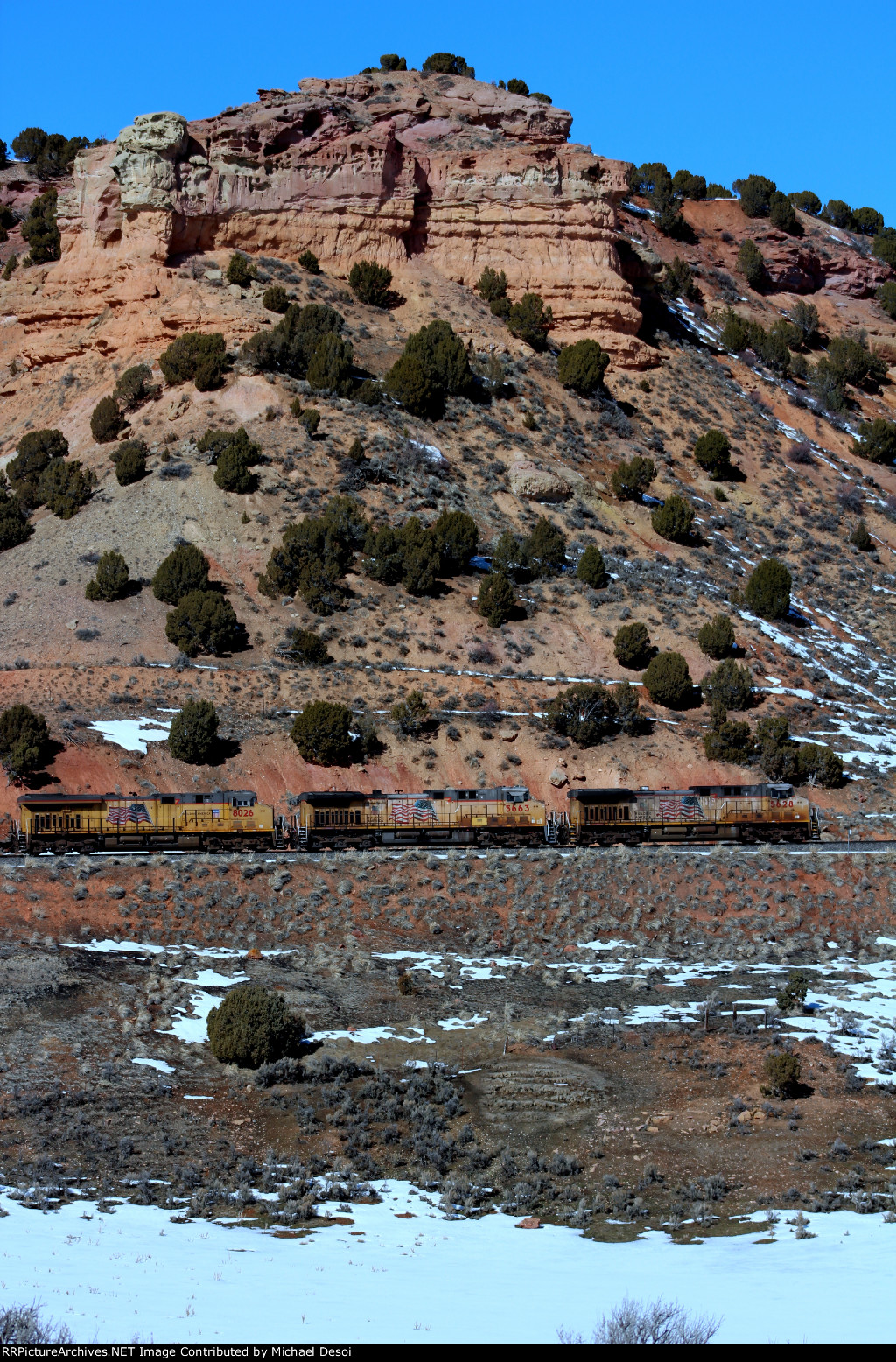 UP 5628, 5663, 8025 (C44ACCTE, C44ACCTE, C45ACCTE) lead an eastbound manifest at Castle Rock, Utah. February 19, 2022 {Winter Echofest}